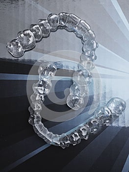 Invisible dental teeth brackets tooth aligners plastic braces retainers to straighten teeth. Orthodontic temporary