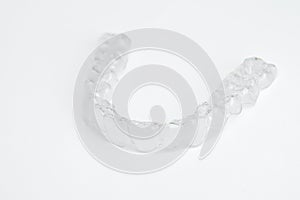 Invisible teeth aligners isolated on white background
