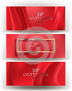 Invitation cards with red fabric on the background.