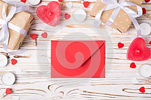 Invitation on marriage concept. Top above close up view photo of border valentines day composition and red envelope on textured