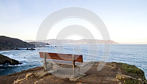 Inviting bench in Loiba cliffs, Galicia, Spain photo