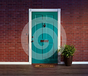 Inviting blue front door with welcome mat