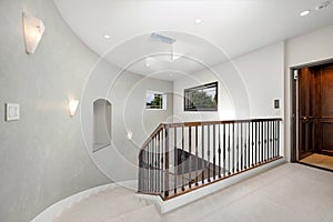 Inviting entrance to a beautiful home with a charming stairway in California