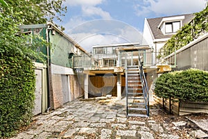 Modern Outdoor Space with Stairs and Greenery photo