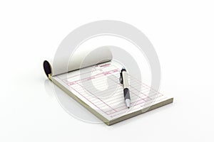 Invoice book which open blank page with pen.