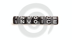 Invoice - Business Vocabulary Word on Black Dice isolated on white background.