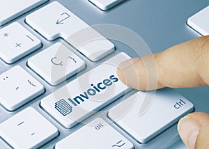 Invoices - Inscription on Blue Keyboard Key