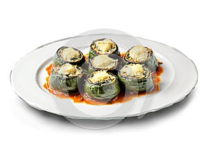 Involtini di Melanzane eggplant rolls stuffed with ricotta and spinach served on a transparent glass photo