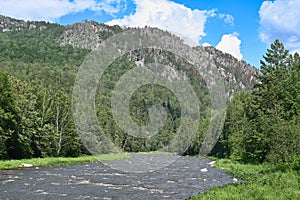 Inzer mountain river near Aigir rocks