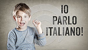 Io parlo Italiano, I speak Italian, Boy on grunge background writing