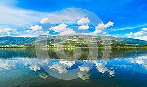 Ioannina lake Pamvotida in Epirus Region, Greece. Artistic panoramic view with natural reflection in the water