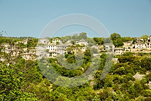 Ioannina village Vitsa in spring season old tranditional houses and green trees