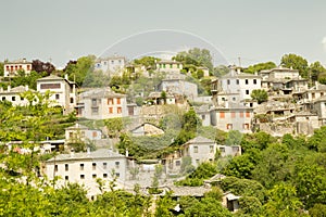 Ioannina village Vitsa in spring season old tranditional houses and green trees