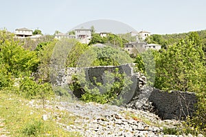 Ioannina village Vitsa in spring season old tranditional houses and green trees