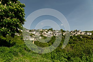 Ioannina village Vitsa in spring season old tranditional houses and green trees