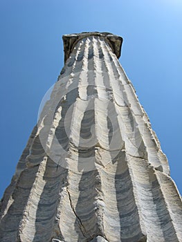 Ionic column against blue sky, ancient city Priene, Turkey photo
