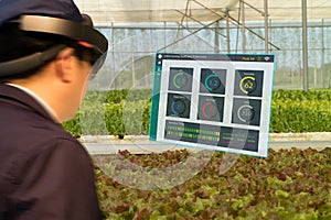 Iot smart industry robot 4.0 agriculture concept,agronomist,farmerblurred using smart glasses augmented mixed virtual reality,a