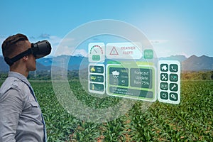 Iot smart industry robot 4.0 agriculture concept,agronomist,smart farmer using smart glasses augmented mixed virtual reality,arti