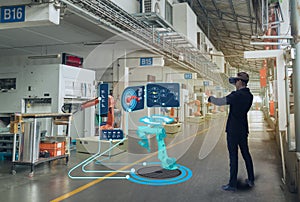 Iot smart technology futuristic in industry 4.0 concept, engineer use augmented mixed virtual reality to education and training, r