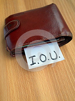 IOU Note Stuffed into a Money Wallet