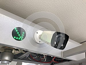 IP camera and green arrow indicator on turnstile