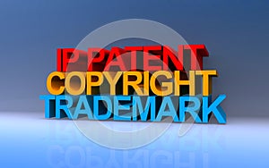 ip patent copyright trademark on blue
