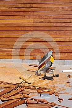 Ipe wood fence installation carpenter table saw photo