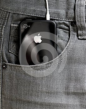 Iphone in a pocket of jeans.