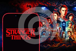 Iphone 13 pro with the Stranger Things logo Things is an American web series of suspense and science.