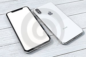 IPhone Xs Silver mock-up composition on white wood