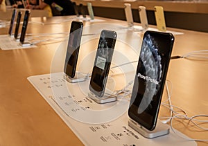 IPhones on Display in an Apple Store