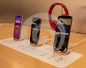 IPhones on Display in an Apple Store