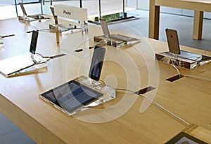 IPhones displayed in an apple store