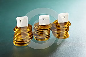 IPO letter on gold coins stack photo