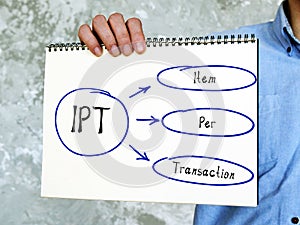 IPT Item Per Transaction on Concept photo. Young Man Holding a notepad photo