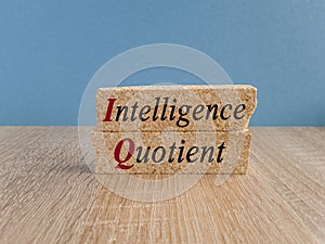 IQ intelligence quotient symbol. Concept words IQ intelligence quotient on brick blocks