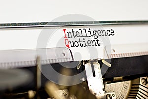 IQ intelligence quotient symbol. Concept words IQ intelligence quotient on white paper typed on retro typewriter. Beautiful white
