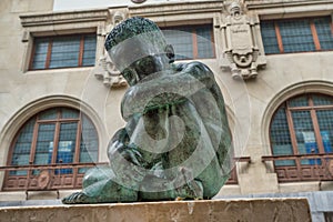 Sad Child bronze sculpture in the middle of Vitoria-Gasteiz, Spain.