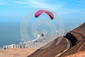 Iquique behind a huge dune, Atacama Desert, Chile