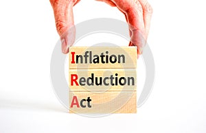 IRA inflation reduction act symbol. Concept words IRA inflation reduction act on wooden blocks on a beautiful white table white photo