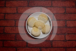 Irani Bhog sweet served in plate isolated on background top view of bangladeshi dessert food