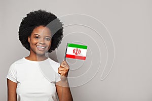 Irani woman holding flag of Iran Education, business, citizenship and patriotism concept photo