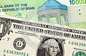 Iranian 10000 Rial Note With American One Dollar Bill