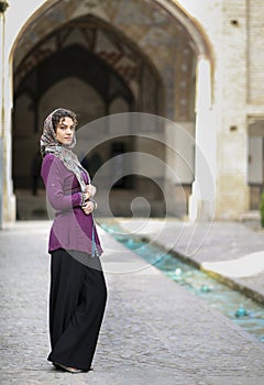 Iranian lady in Fin gardens in Kashan, Iran