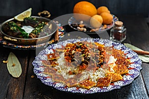 Iranian sweet rice with orange zest, nuts and dried fruits, shirin polo