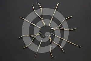 ÃÂ¡ircle of manicure tools on the dark background