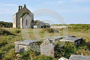 Ireland Aran island ruin church and tombs photo
