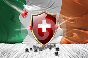 Ireland flag with Metal Shiny red shield. virus protection, hygiene shield. virus Vaccine Protection aganst coronavirus, Health