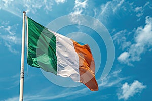 Ireland flag waving on blue sky background