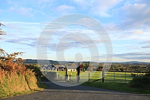 Exploring Ireland Countryside - greenary, blue sky, small houses - Irish countryside tours photo